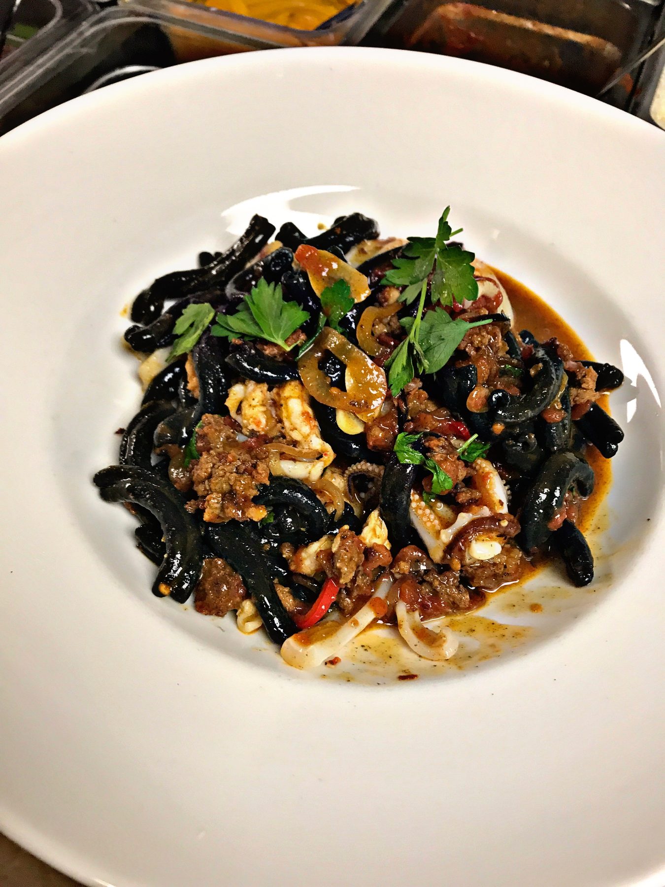 Squid ink pasta with seafood and chorizo by Chef Morris