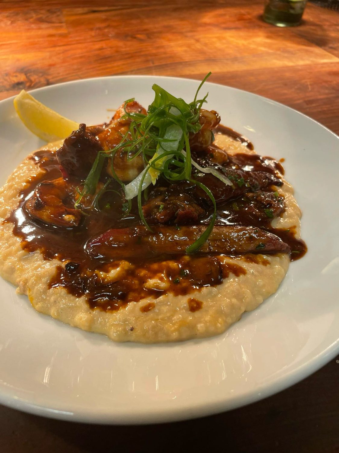 BBQ shrimp over grits, by Chef Morris