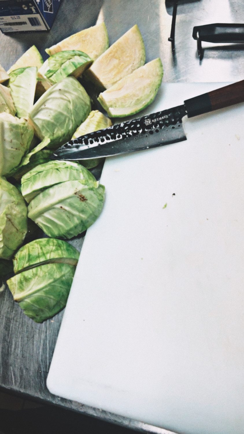 Cabbage prep with a hand-forged chef's knife