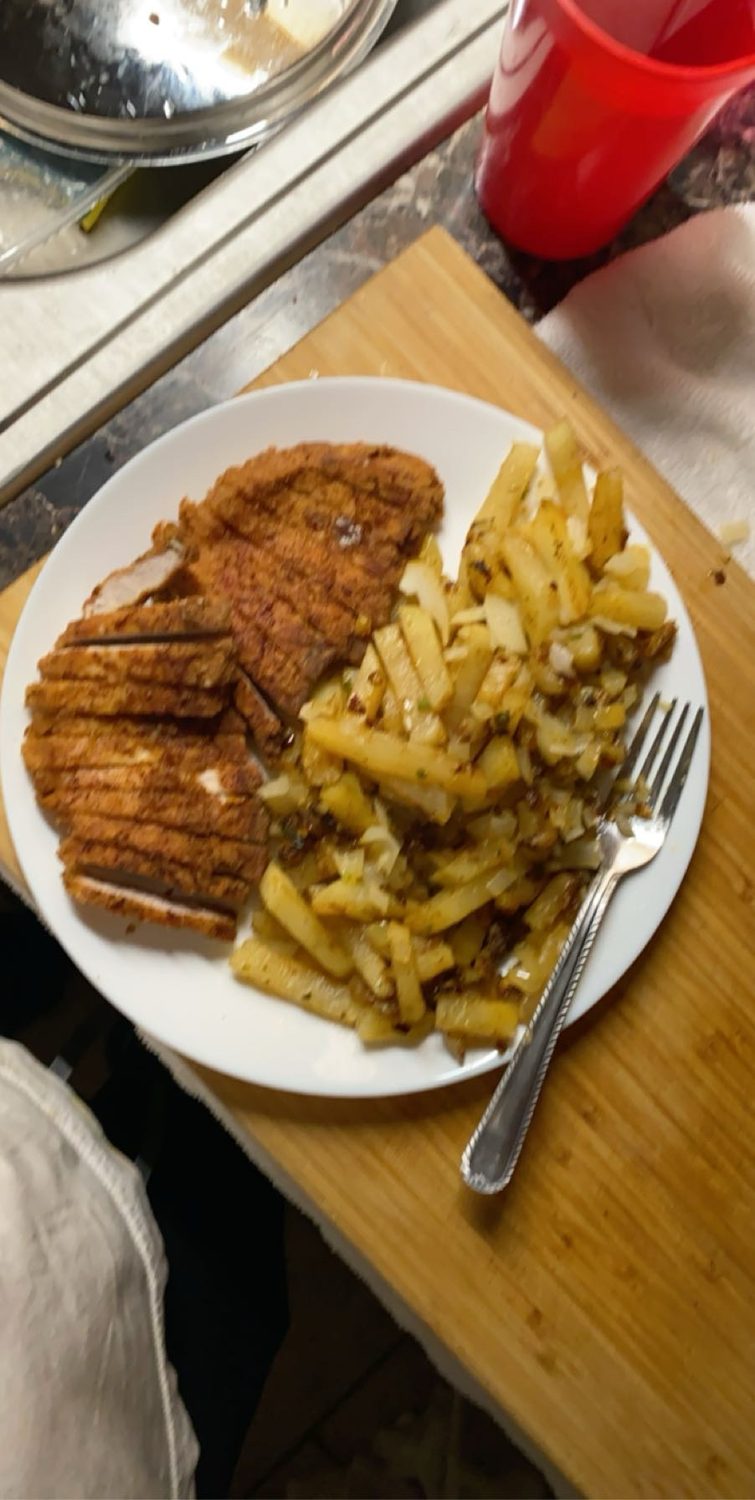 Crispy chicken cutlet with pan-fried potatoes