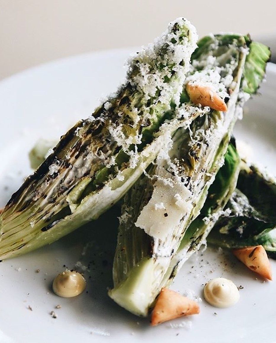 Charred romaine caesar with shaved parmesan